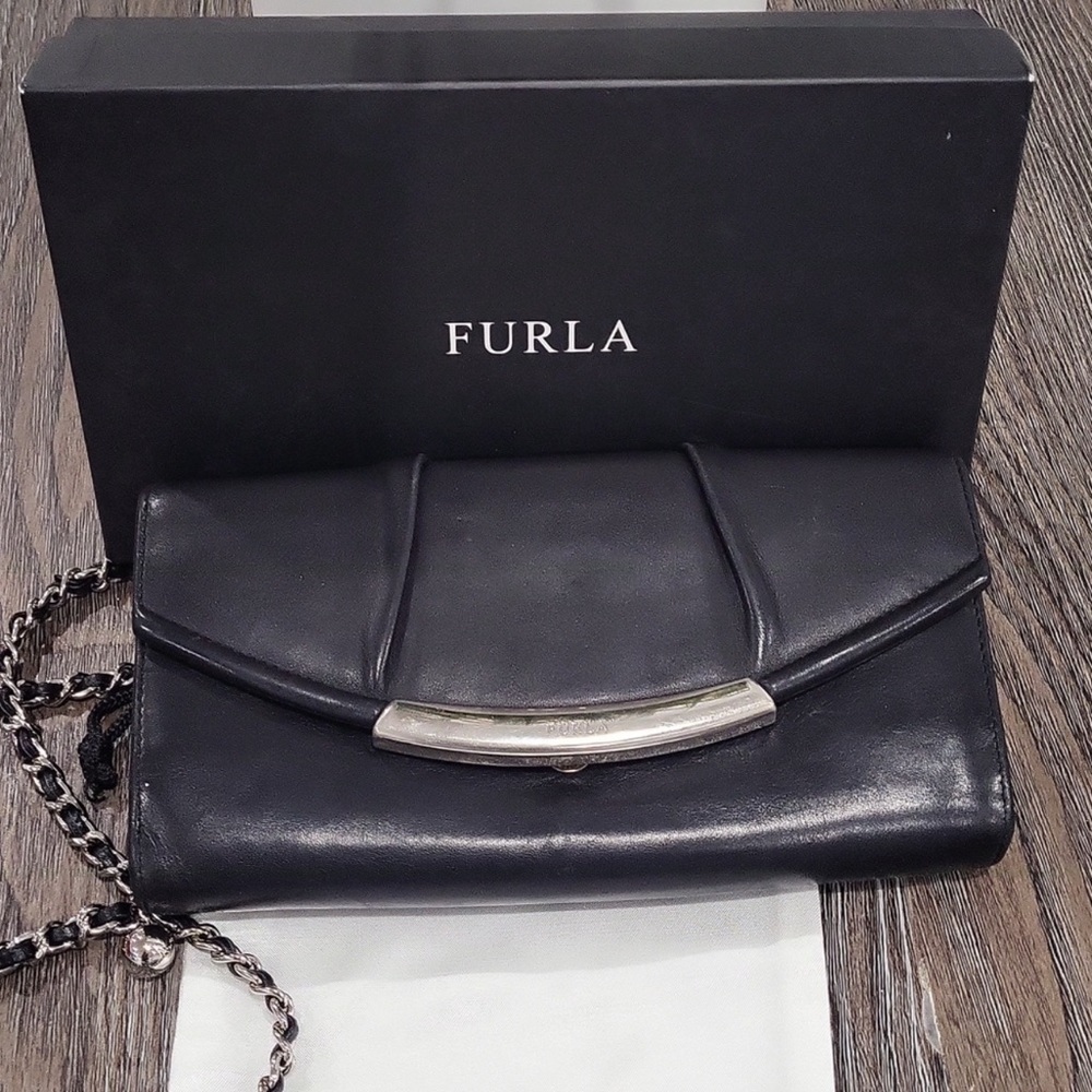 A Classic Furla Black Leather Wallet with Silver Accents